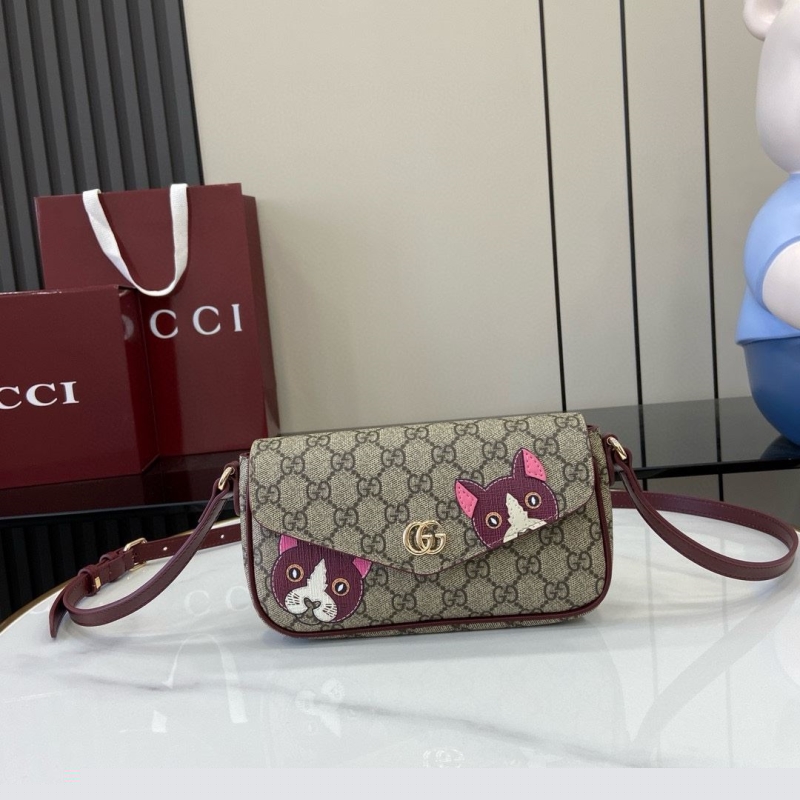 G*u*i satchel bags